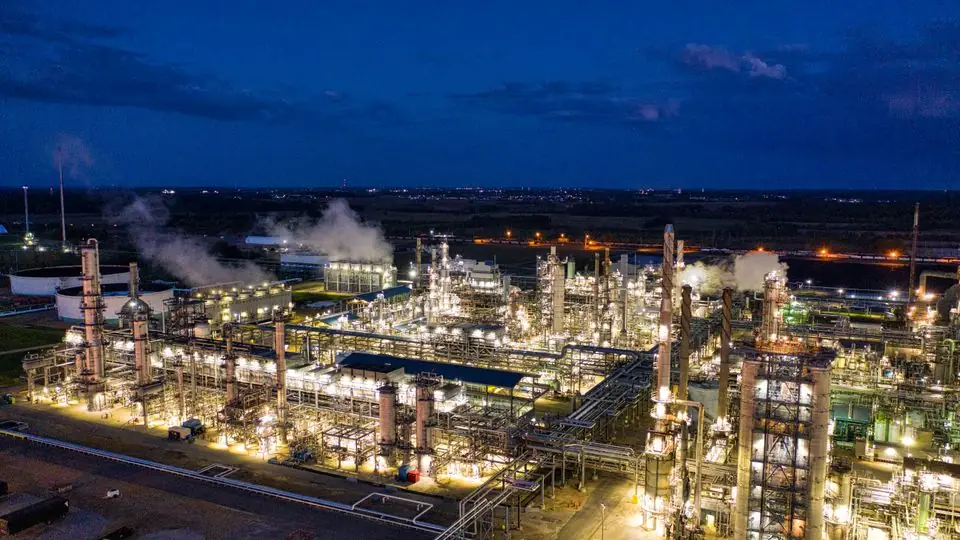 Oil refinery lit up at night