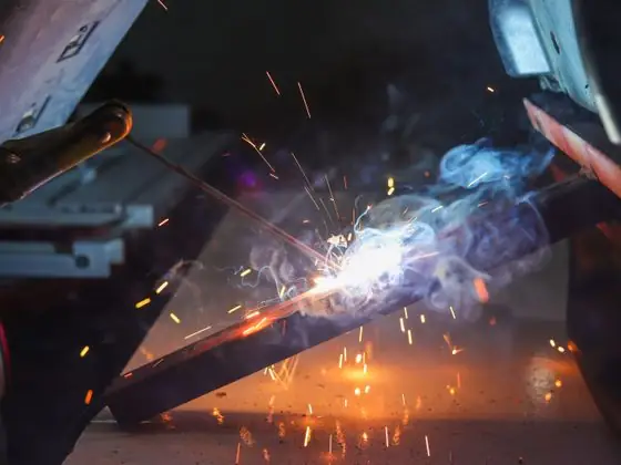 Welding sparks in a fabrication yard